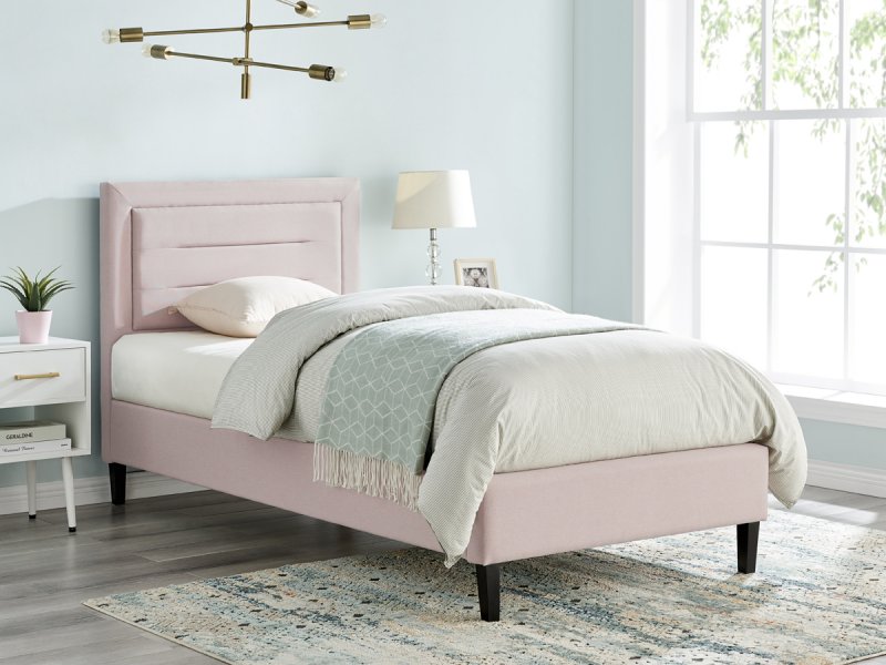 Ortase bedstead in pink fabric